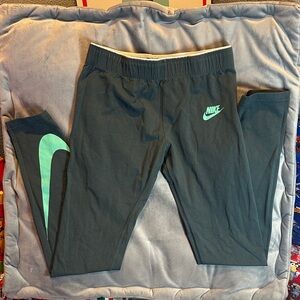 Nike juniors forest green Leggings with Aqua Logo